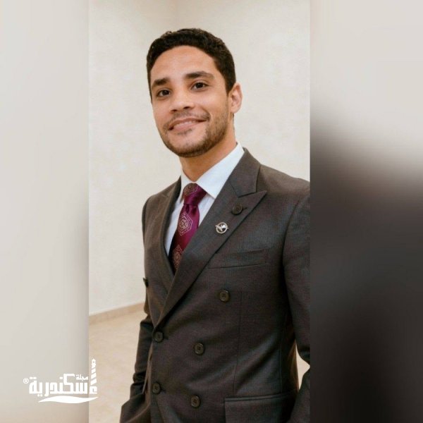 الكاتب علي عزام