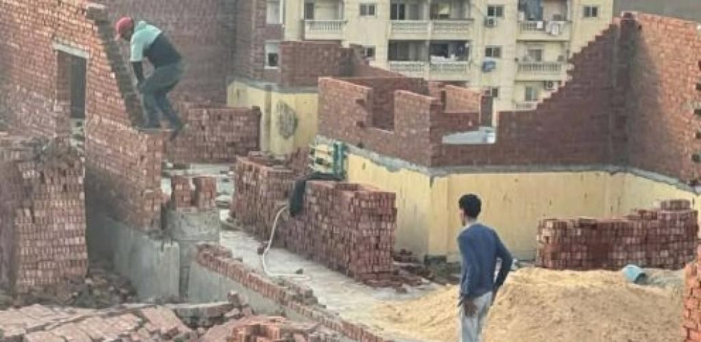 إيقاف أعمال بناء مخالف والتحفظ على "ونش" في حملة مكثفة لحي ثان المنتزه بشارع 10 إسكوت