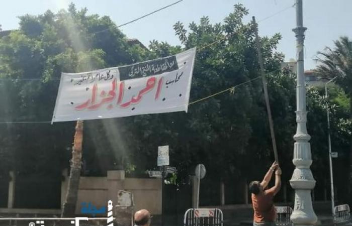 حملة لازالة الاعلانات المخالفة بحي وسط